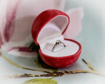 Pretty silver and CZ ring peach-presented