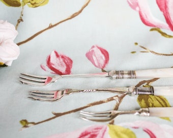 Trio of Victorian pickle forks: mother of pearl, sterling silver and silver plate