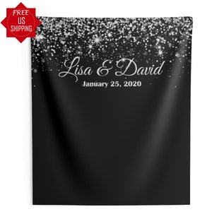 May include: Black backdrop with a silver glitter overlay. The text "Lisa & David" and "January 25, 2020" is written in silver glitter.