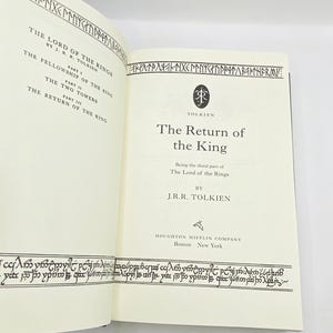 May include: Open book with the title "The Return of the King" by J.R.R. Tolkien. The book is part of "The Lord of the Rings" trilogy. The book's pages are cream-colored with black text and decorative borders.