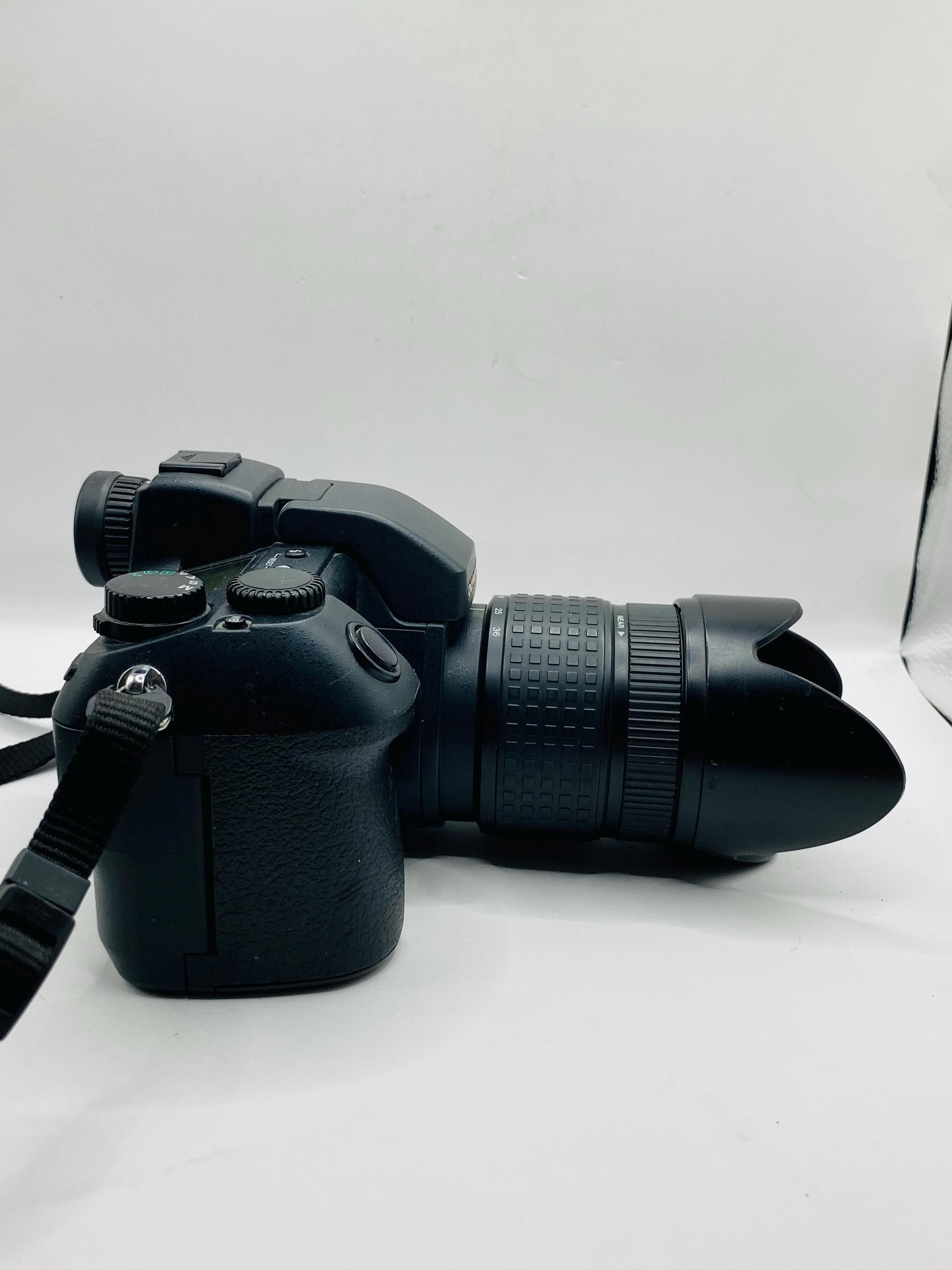 Canon EOS Rebel T3 / 1100D 12.2MP Digital SLR Camera - Black (Body Only