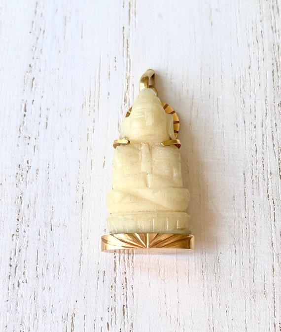 Vintage 18k gold Buddha hand carved shell pendant 