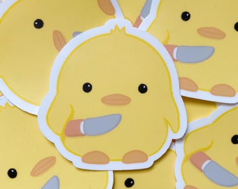 stuffed duck holding knife