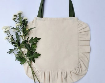 Natural Cotton Ruffle Bag with a Contrasting Dark Green Strap
