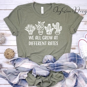 Kindergärtnerin-T-Stück, wir alle wachsen zu unterschiedlichen Raten Lehrer-Hemd, Lehrer-T-Stück, Geschenk für Grundschullehrer-T-Shirt, lustige Lehrer-Hemden