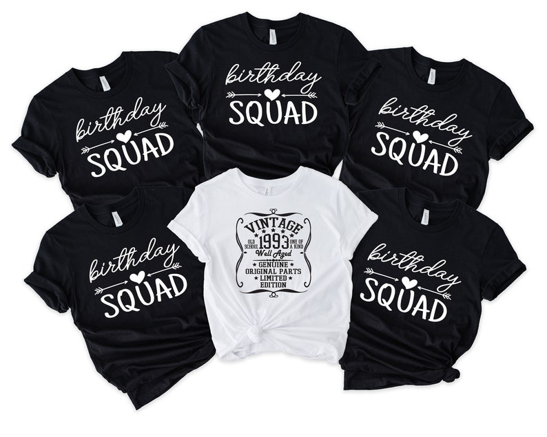 May include: Five black t-shirts with white text that reads "birthday squad" and an arrow and heart design. One white t-shirt with black text that reads "Vintage 1993 Well Aged * Genuine Original Parts * Limited Edition".