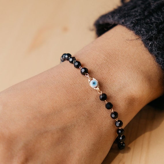 Dulcett India| Evil Eye Bracelet | Black Beads Evil Eye Bracelet |  Adjustable Threads Evil Eye Bracelet | Black Crystal Evil Eye Bracelet With  Elephant Charms : Amazon.in: Fashion