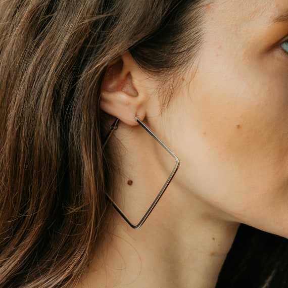 Thin line best sale earrings