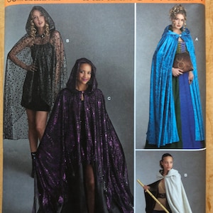 May include: A Simplicity sewing pattern for Halloween costumes. The pattern includes three different cape designs: a black and white polka dot cape, a purple sequined cape, and a light blue velvet cape. The pattern number is R11582.
