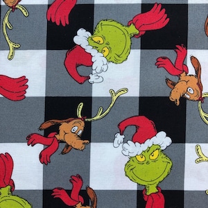 Grinch and Max on a Buffalo Print Black and White Check Christmas Lightweight Woven Cotton Grinch Christmas Fabric Robert Kaufman Dr. Suess
