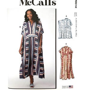May include: McCall's sewing pattern M8516. The pattern features a woman wearing a long, striped dress with short sleeves. The dress has vertical stripes in shades of blue, pink, and white. The pattern also includes illustrations of two other dress designs.