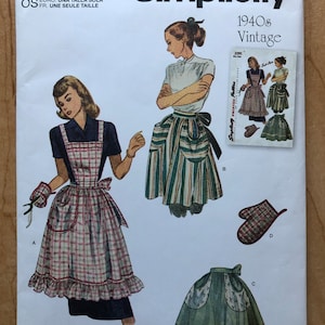 May include: Simplicity sewing pattern for a vintage 1940s apron. The pattern includes three different apron styles: a gingham apron with a ruffle, a striped apron with pockets, and a green apron with a bow. The pattern also includes instructions for making a matching oven mitt.