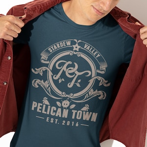 Stardew Valley Shirt, Pelican Town Shirt, Stardew Shirt, Stardew Valley Gift, Stardew Valley Art, Stardew Unisex Jersey Short Sleeve Tee