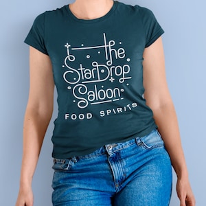 Stardew Valley Shirt, Stardew Shirt, Stardrop Saloon Shirt, Stardew Valley Gift, Pelican Town Unisex Jersey Short Sleeve Tee