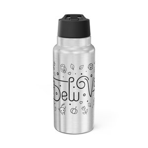 May include: A silver stainless steel water bottle with a black lid. The bottle has a black and white design with the words "Del.V." and small illustrations of leaves, hearts, and animals.