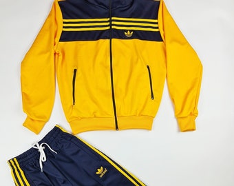 yellow adidas tracksuit black stripes