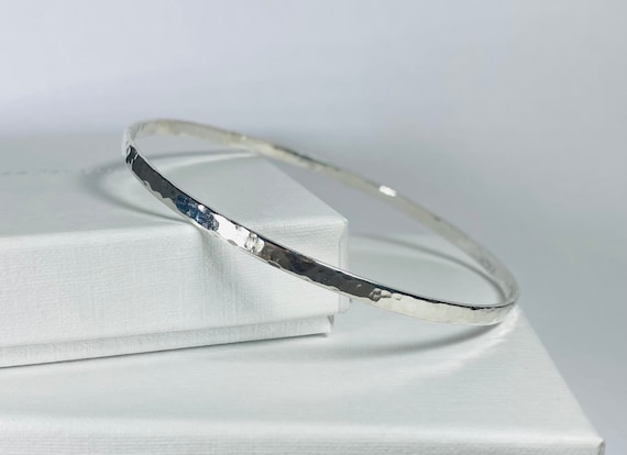 Sterling silver flat bangle. Sterling silver flat bangle.