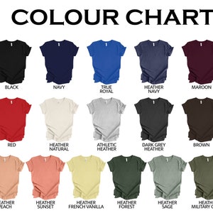 May include: A color chart displaying various t-shirt colors, including white, black, navy, and red. The chart also features shades like heather navy, maroon, and brown. The text "COLOUR CHART" is at the top.