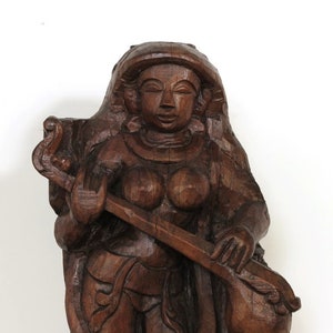 Statue of Indian deities Sarasvati