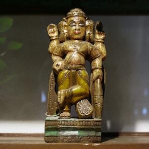 lacquered Indian wooden statue on plaster base 22