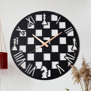 May include: Black and white chessboard clock with Roman numeral markings and chess piece cutouts. The clock is mounted on a white wall in a living room setting.