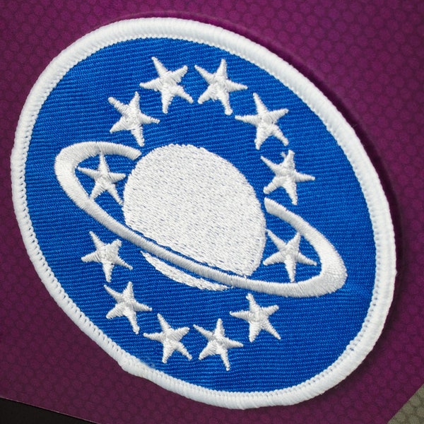 Toppa con emblema uniforme Galaxy Quest NSEA