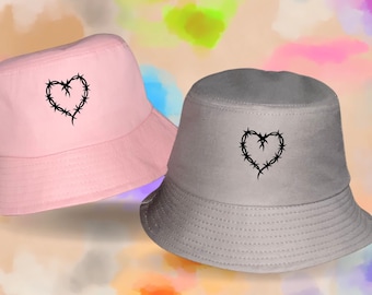 Karol G Heart Tattoo Bucket Hats | Karol G Merch, Bichota heart, Concert Fit, Karol G Bucket Hat, Karolg Caro, Karol G heart with wire