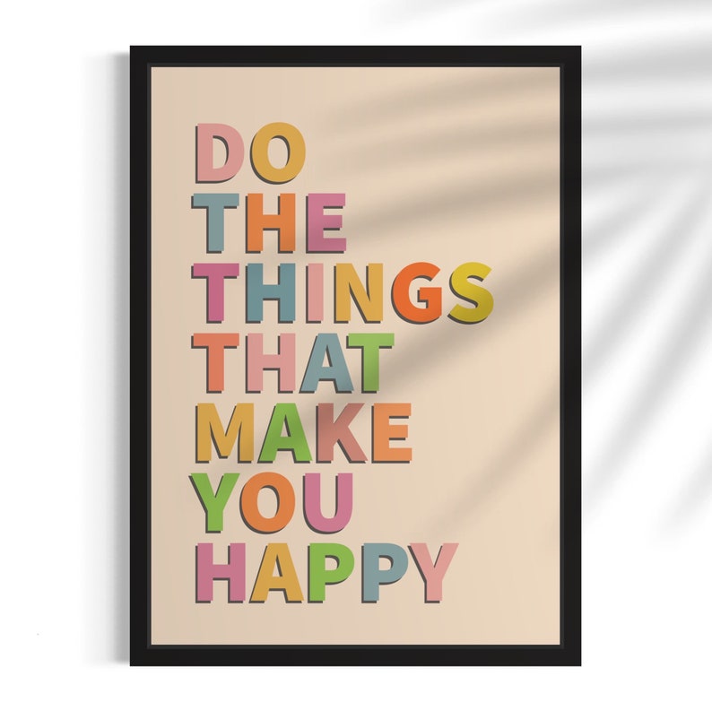 May include: A motivational poster with the text "DO THE THINGS THAT MAKE YOU HAPPY" in colorful letters on a beige background.