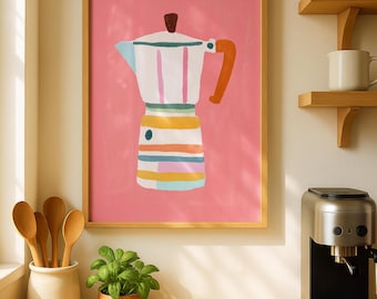 May include: A framed wall art print featuring a stylized illustration of a moka pot coffee maker. The pot is white with horizontal stripes in orange, yellow, pink, and light blue, set against a solid pink background within a light wood frame.