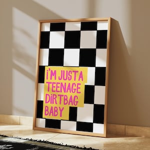 May include: A black and white checkered poster with a yellow rectangle on top of the checkers. The rectangle has the text "i'm just a teenage dirtbag baby" in pink letters.
