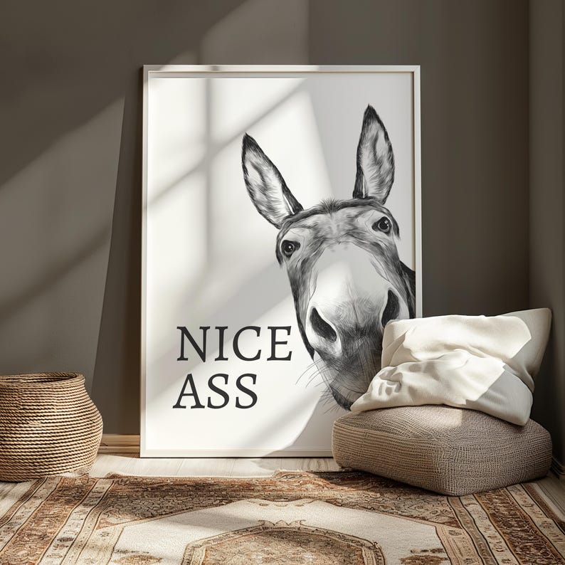 White and grey bathroom wall art print featuring a donkeys face with the humourous quote Nice Ass.