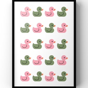 May include: A framed print with a pattern of pink and green rubber duckies. The duckies are arranged in rows of four, with alternating colors.