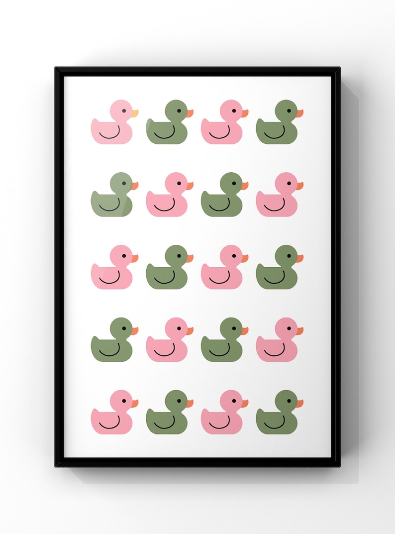 May include: A framed print with a pattern of pink and green rubber duckies. The duckies are arranged in rows of four, with alternating colors.