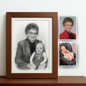 May include: A framed pencil portrait of a woman holding a baby, with two smaller photos to the right. The portrait is in a brown frame, and the baby wears overalls. The smaller photos show the woman and baby.