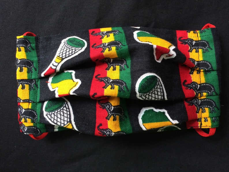Maske afrikanische Stoffe Afrika Reggae Palmen Bus bunte