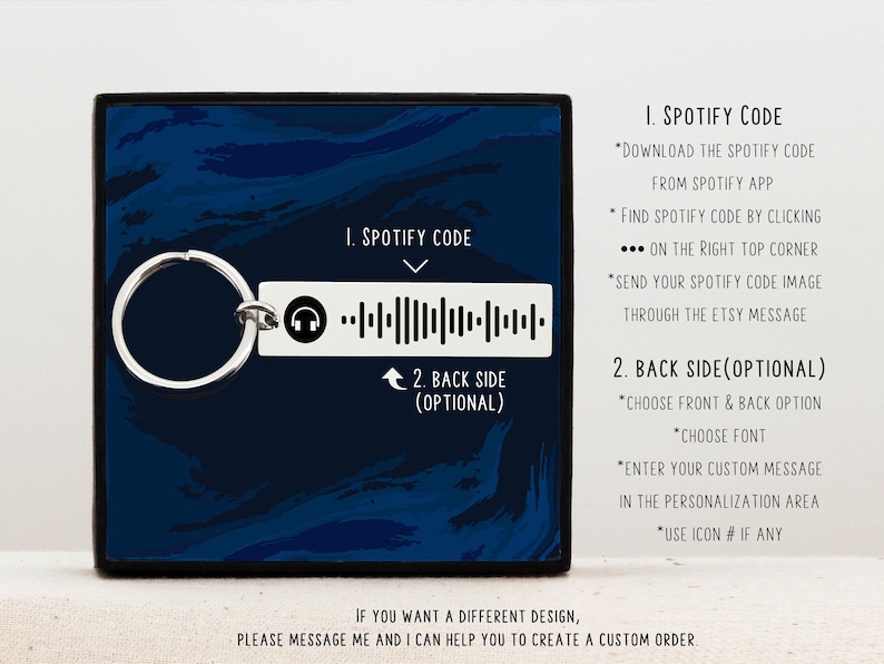 May include: A silver keychain with a black and white Spotify code on a blue background. The text "1. Spotify Code" and "2. Back Side (Optional)" is displayed on the image. Instructions for using the Spotify code are listed below the image.