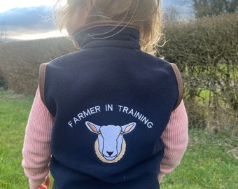 Children’s Fleece Gilet With Farmer In Training Sheep Design