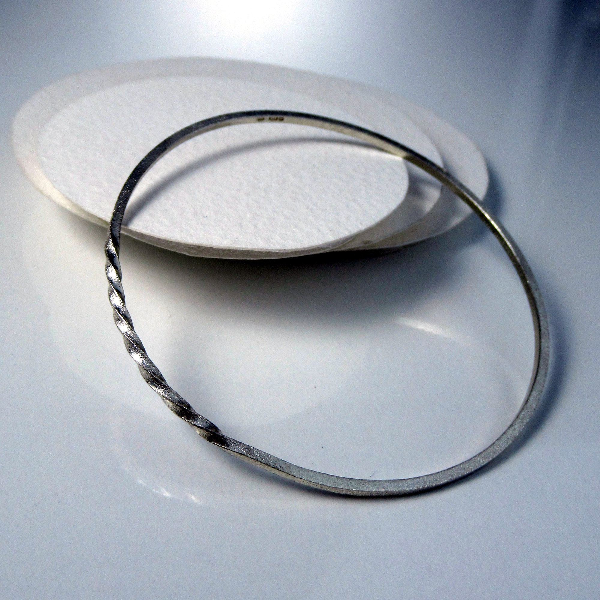 Small Classic Silver Bangle With a Twist, Textured Steling