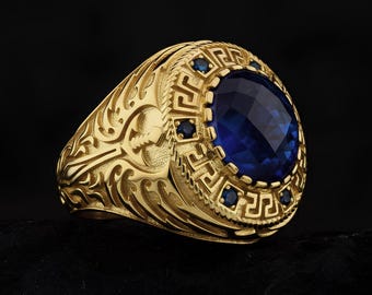 Anillo de sello de oro de 14 quilates con zafiro azul y motivos de espada lateral
