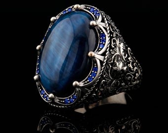 Anillo artesanal de ojo de tigre azul para hombre, plata de ley ornamentada.