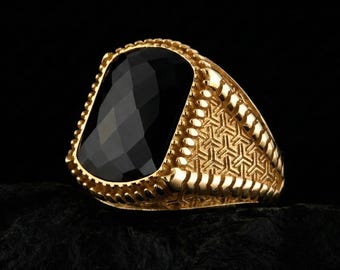 Anillo de sello para hombre de oro macizo de 14 quilates con ónix negro y diseño geométrico.