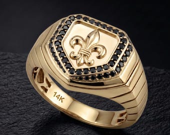 Anillo de sello para hombre de oro macizo de 14 quilates con flor de lis y piedras de circonita cúbica negra.