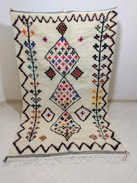 Berber carpet, carpet handmad, Traditional white carpet decorated with different and beautiful colors and shapes