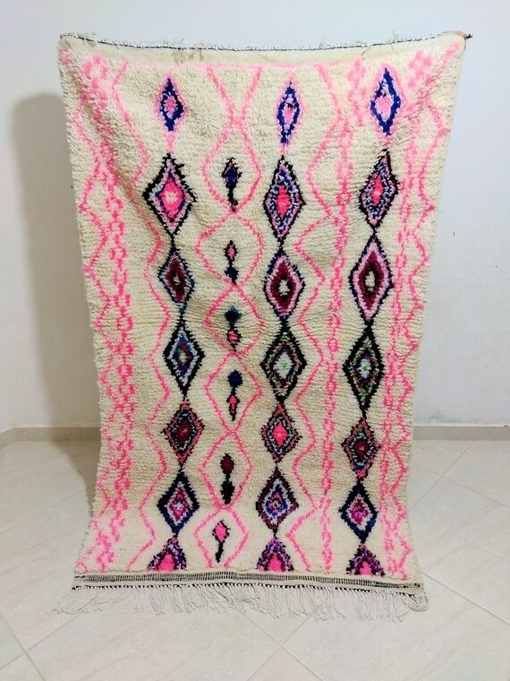 Amazigh rug from the Azilal mountains, woven white natural wool rug decorated with some beautiful colors