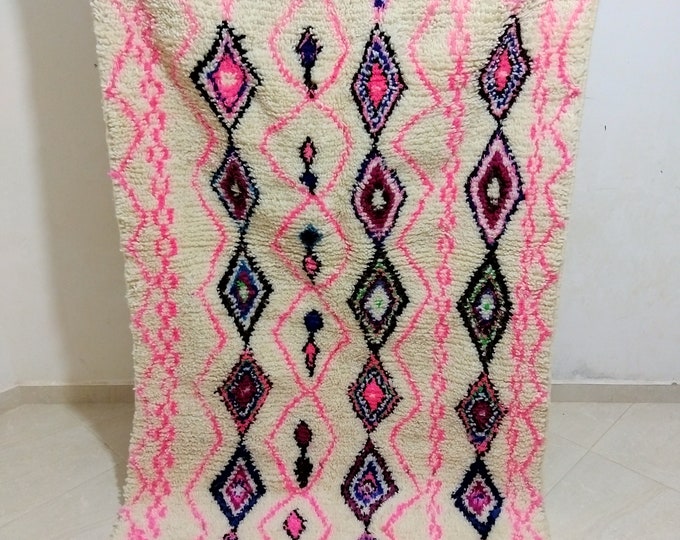 Amazigh rug from the Azilal mountains, woven white natural wool rug decorated with some beautiful colors