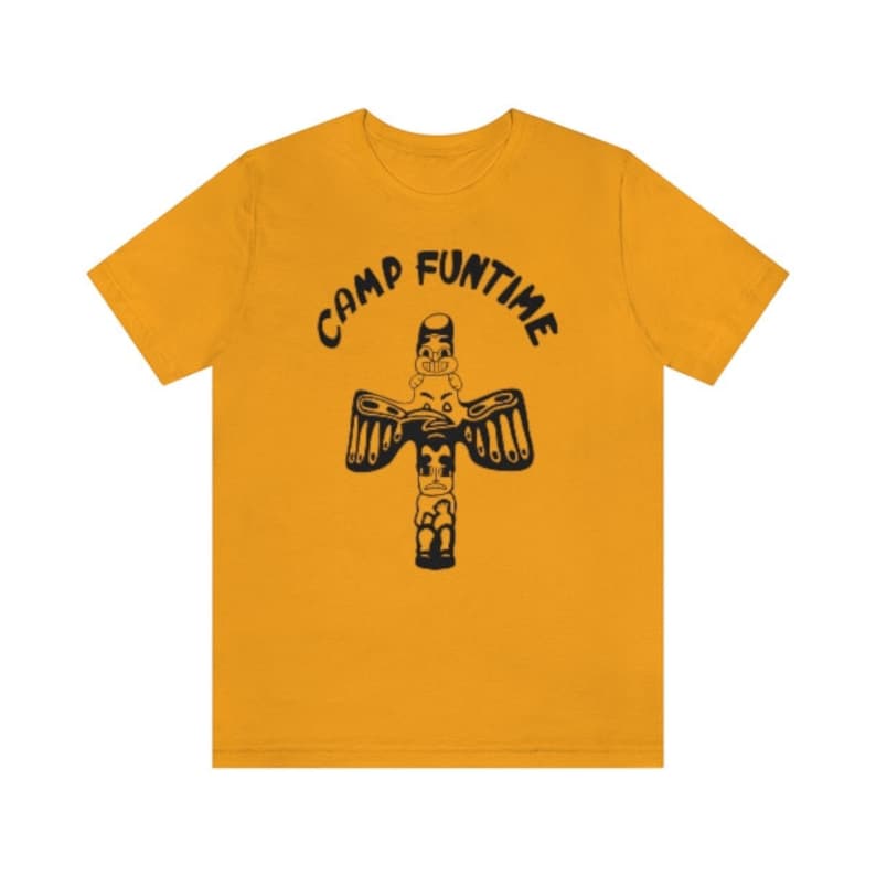 May include: A yellow t-shirt with a black graphic of a totem pole and the text "Camp Funtime".