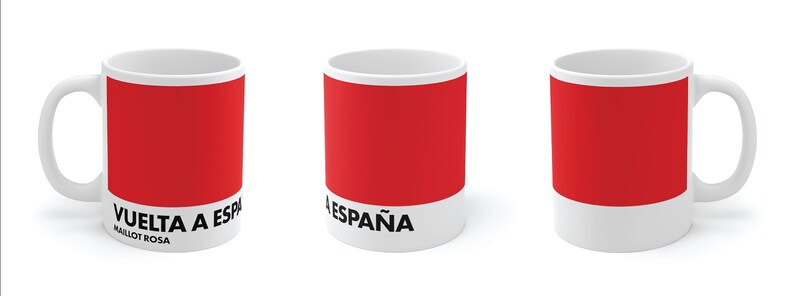 May include: White ceramic mug with a red band and black text that reads "VUELTA A ESPA&Ntilde;A MAILLOT ROSA".