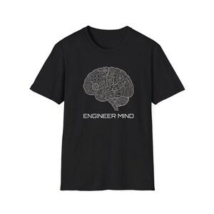 May include: Black t-shirt featuring a white graphic of a brain composed of gears and mechanical components. The text "ENGINEER MIND" is printed below the brain illustration. A crew neck t-shirt.
