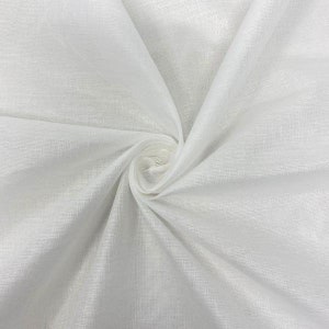 May include: White fabric with a smooth, slightly textured surface. The fabric is folded and draped, creating soft folds and curves.