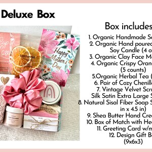 May include: A pink and white gift box filled with various items, including a pink headband, a small jar of face mask, a bar of soap, a card that says "Happy Mother's Day", and a pair of cozy socks. The box includes a variety of organic products, such as handmade soap, herbal tea, and a soy candle. The box is decorated with a pink ribbon and a gift tag.